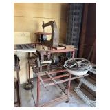 Vintage electric jig saw on cart untested