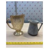 Carnival glass Iris pitcher and ceramic pitcher