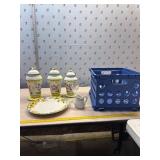 Plastic crate with Gibson Canisters plate and
