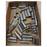 3/8ï¿½ and 1/4ï¿½ sockets and ratchet