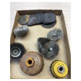 Grinding wheels and brushes