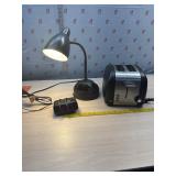 Alarm clock, desk lamp and toaster