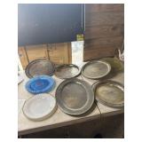 Silver plates trays, milk glass and blue plates