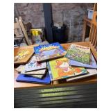 Lot of children books and wood magazine rack