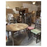 Round wood table 42ï¿½x30ï¿½ and 4 ladder back chairs