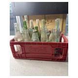 Plastic Coca Cola crate with bottles