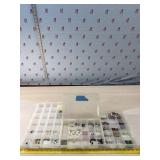 Jewelry items in Plano box organizers