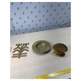 Brass wall art, ashtray and seashell bookends
