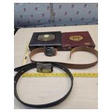 2- wood cigar boxes and 2 belts and buckles