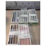 8 new packages of scented Taper candles