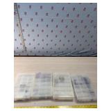 4 containers of jewelry making items