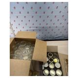 2 boxes of mixed canning jars
