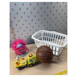 Laundry basket, troll doll head, vtech tractor