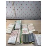 5nee boxes of Taper candles and 1 box of Flutted