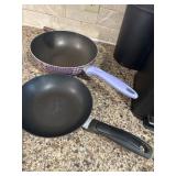 Tfal skillet and purple pan