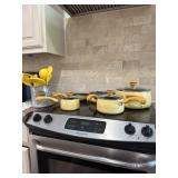 Set of Paula Dean cookware and matching Utensils