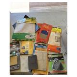 Sand paper and grinding wheel