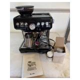 Breville Barista Express with cleaning tabs and