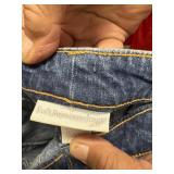 Clothes in closet bring bags