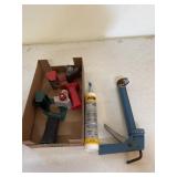 2 tape dispenser, 1/2 tube of construction