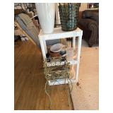 Plant stand and plastic shelf with contents