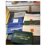 8 small bank bags and 1 larger
