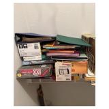 All office supplies and yoga mat in closet