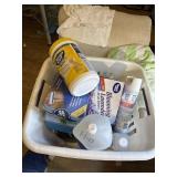 Laundry basket of cleaning supplies , rollers and