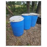 3- 55 gallon plastic barrels w/ lids