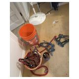 Bucket with halters and lead ropes and Loweï¿½s