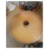 Aged Roll of bubble wrap ON STAIRS