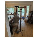 Pole lamp works and coat rack