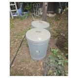 2- metal trash cans with lids