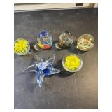 Glass paper weights including star fish