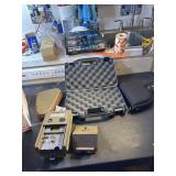 3 pistol cases and Cudde aback game camera