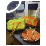2 soft side pet carriers and foam fish