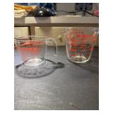 2 Pyrex measuring Cups