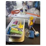 Small tote of cleaning supplies