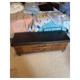 Lane cedar chest with padded top and wheels