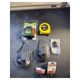 2 new Bullseye Holsters. Tape measures and mini