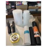 Hole punchers, Frog Tape, Bubble wrap, shelf