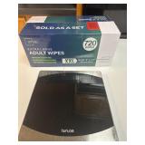 Lg box of Adult Wipes and scale