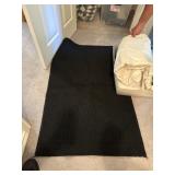 Area rug and king sheets