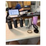 1 Yeti bottle, 2 TAL travel mugs and others