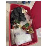 Lg tote with a Christmas decoration on wheels
