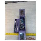 Small jewelry box and contents purple