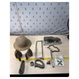 Vintage Sad irons, hard hat, ice skate, hack saw
