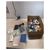 Pens, office supplies, ruler, sunglasses and more