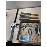 Caulking Gun, dust brooms, and misc hand tools