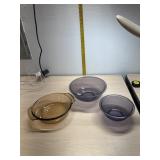 2 purple Pyrex bowls ans Anchor Hocking dish